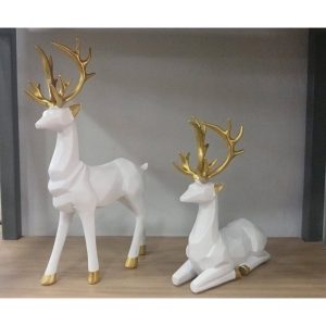 Foto real del set de renos blanco con dorado