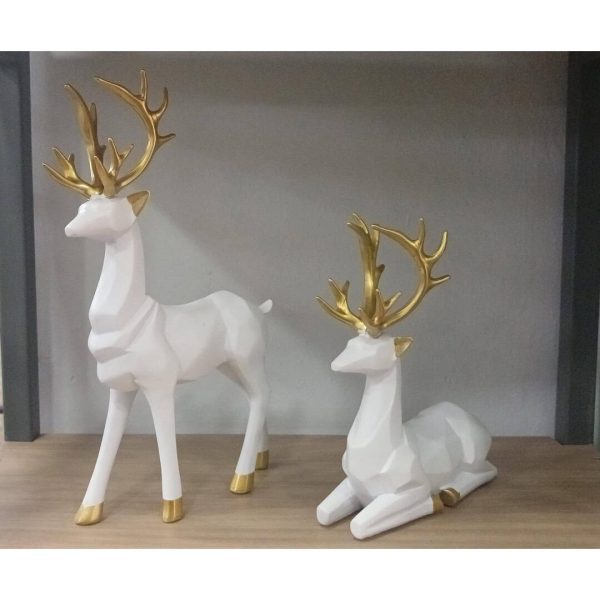 Foto real del set de renos blanco con dorado